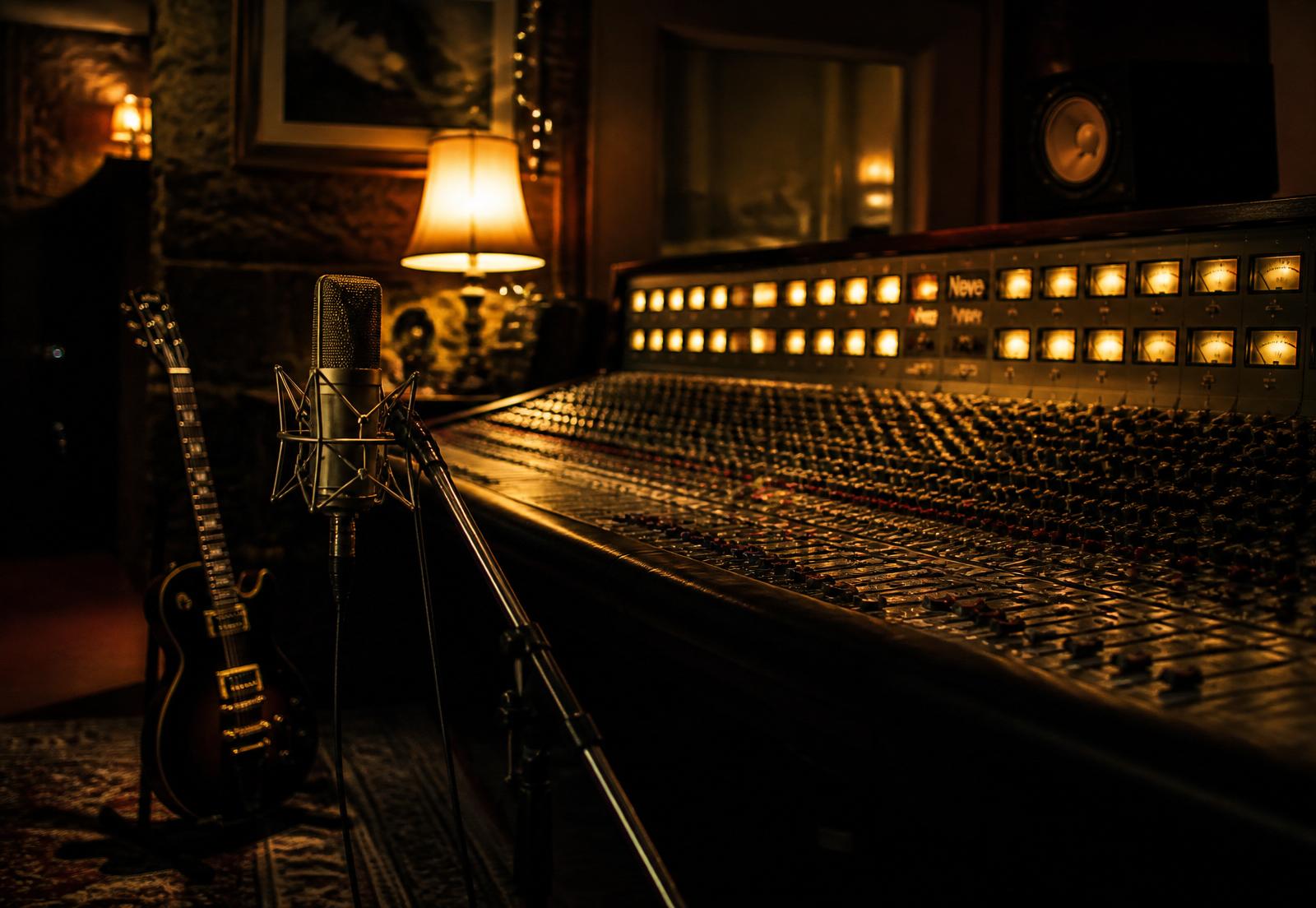 Vintage recording console glowing amber